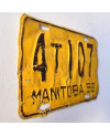 Kanadyjska tablica rejestracyjna Manitoba 1952 Yellow 4T107